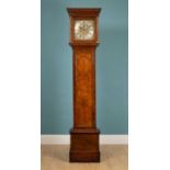 An 18th century and later walnut long case clock