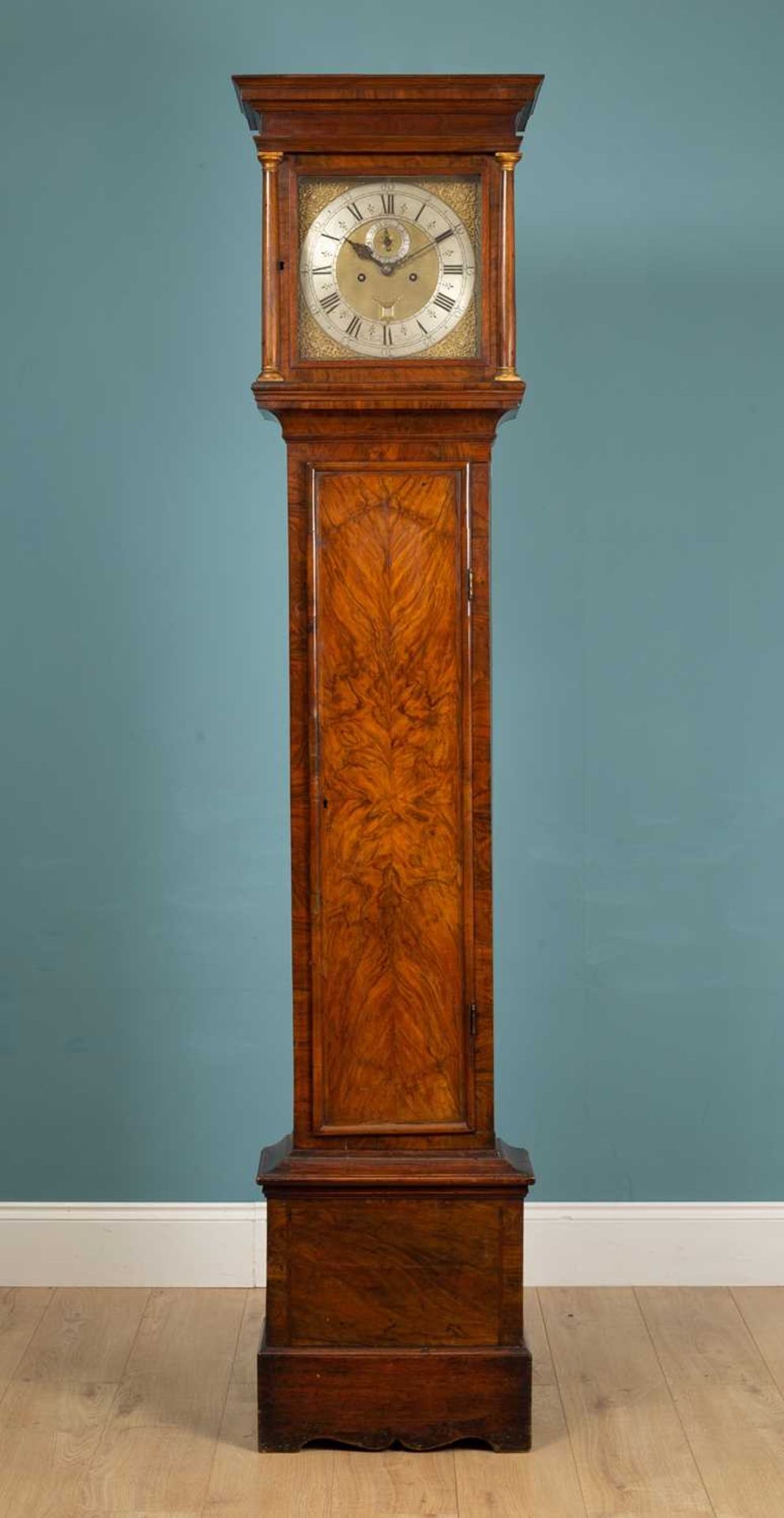 An 18th century and later walnut long case clock