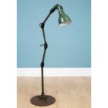 A Mek Elek racing green industrial floor lamp