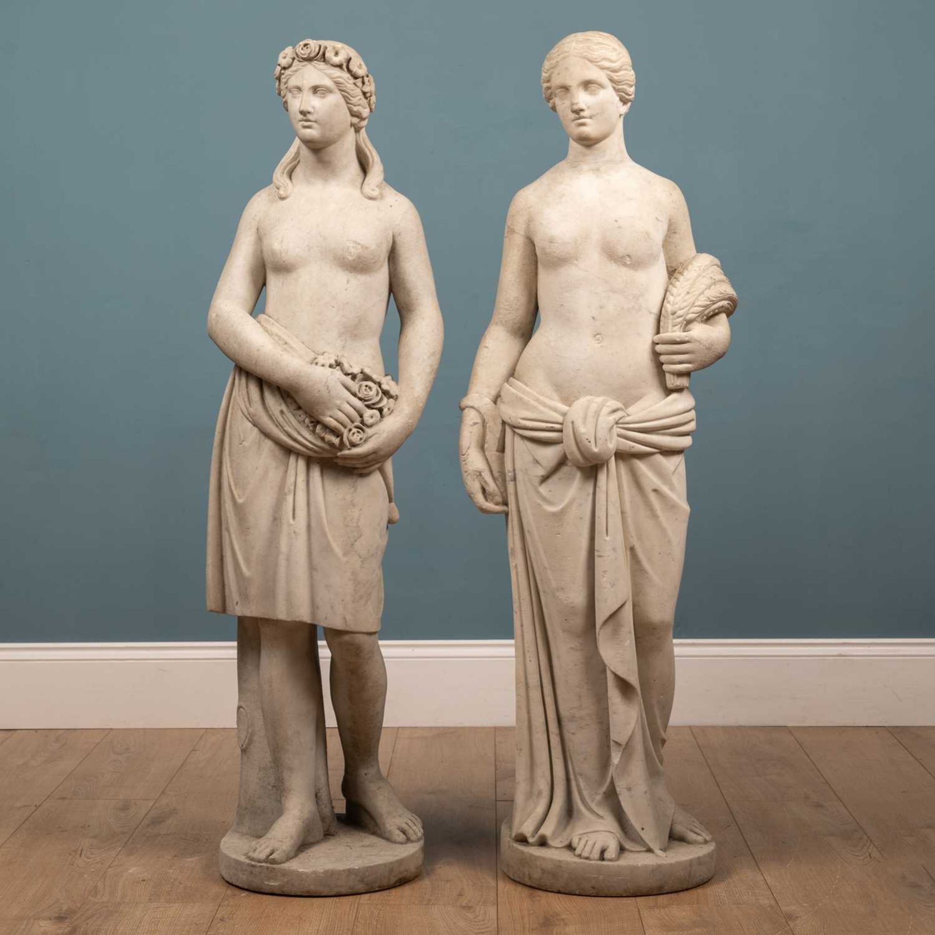 A pair of 19th century Italian white marble sculptures