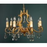 A French style brass eight-branch electrolier or chandelier