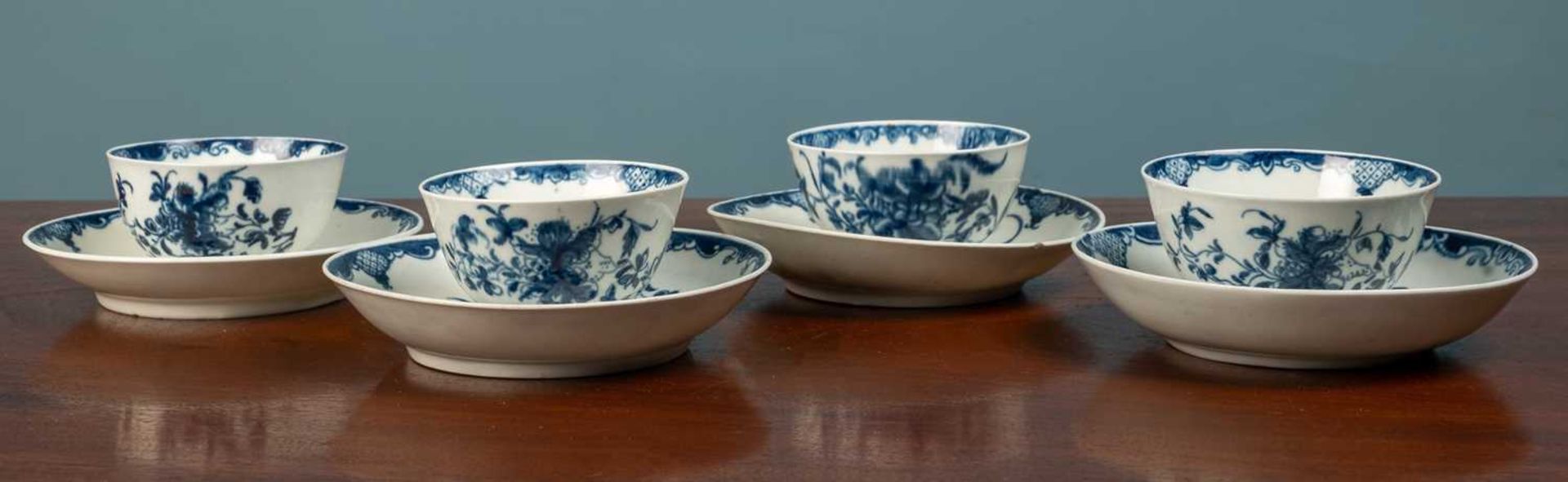 Four 18th century Worcester Mansfield pattern tea bowls and saucers