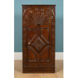 An antique oak cupboard