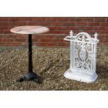 A Victorian white painted cast iron stick stand and a marble-topped cast iron occasional table