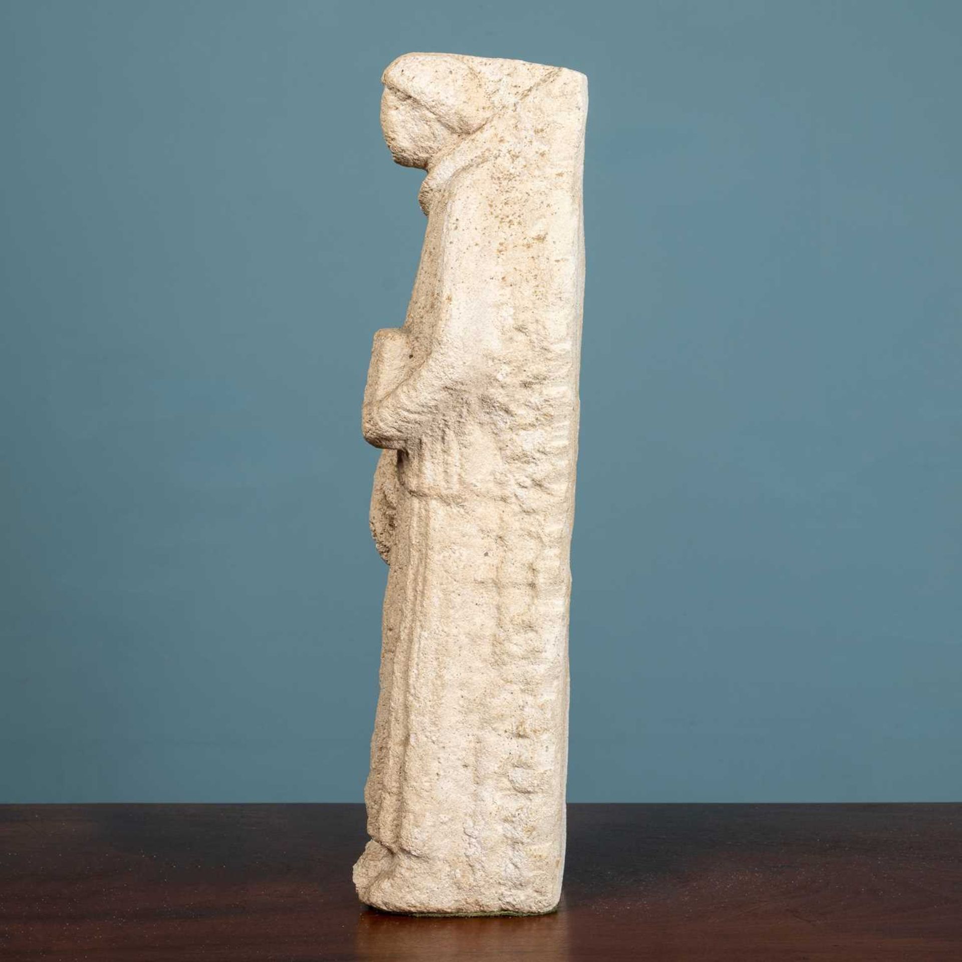 A carved limestone sculpture of a monk - Bild 3 aus 3