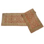 A late 20th century Persian style cream, red and green ground woolen runner