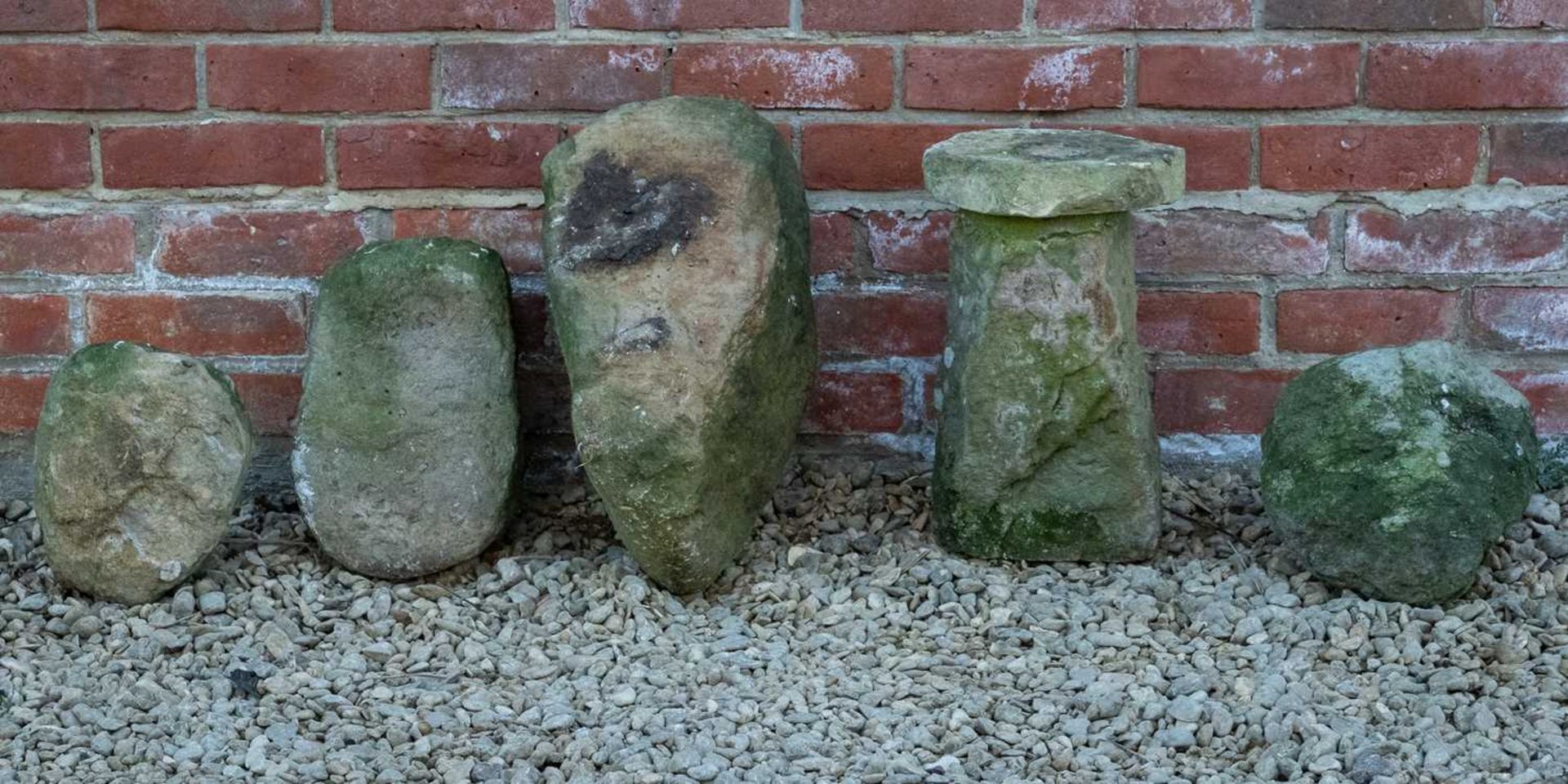 Five roughly carved stone heads - Image 2 of 2