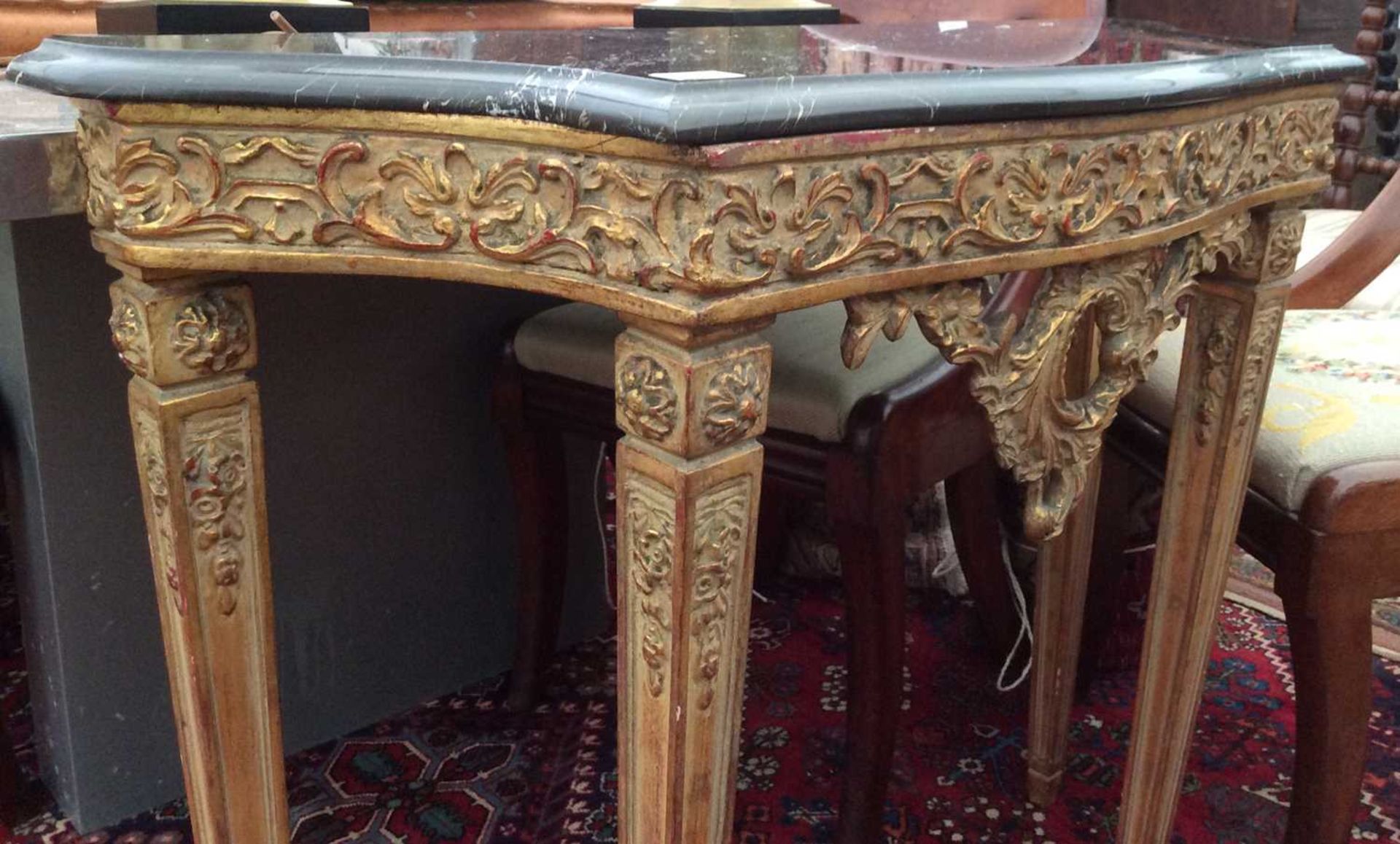 An 18th century French style ornately carved and painted giltwood console table - Image 5 of 7