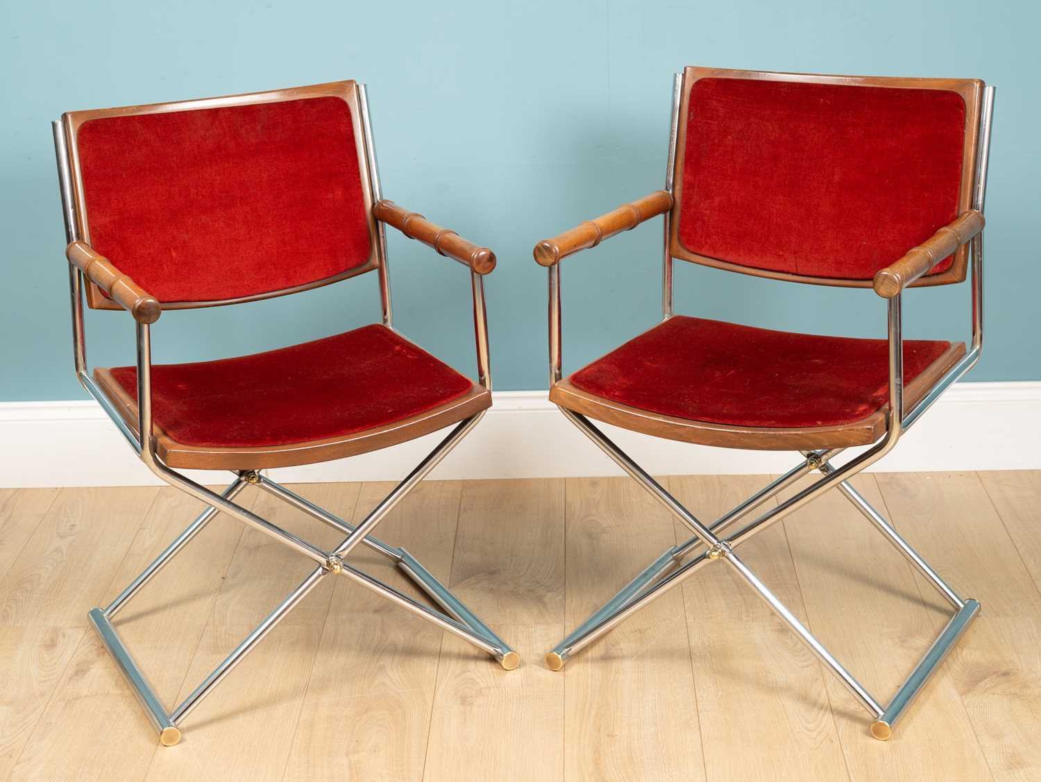 A pair of mid-century Italian director style armchairs