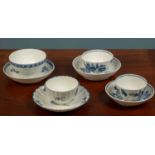 Two 18th century Worcester blue and white 'three flower' patterned tea bowls and saucers