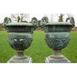 A pair of 18th or 19th century bronze urns designed by Claude Ballin