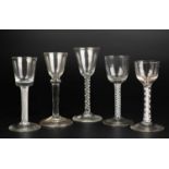 A group of five antique wine glasses