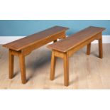 A pair of oak rectangular topped benches