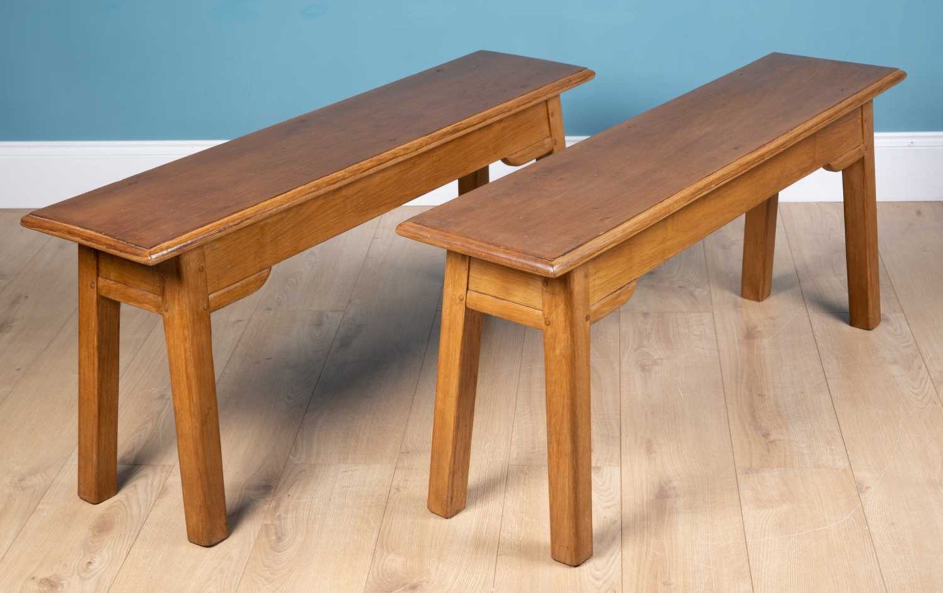 A pair of oak rectangular topped benches