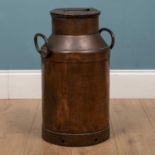 A 19th century copper milk churn