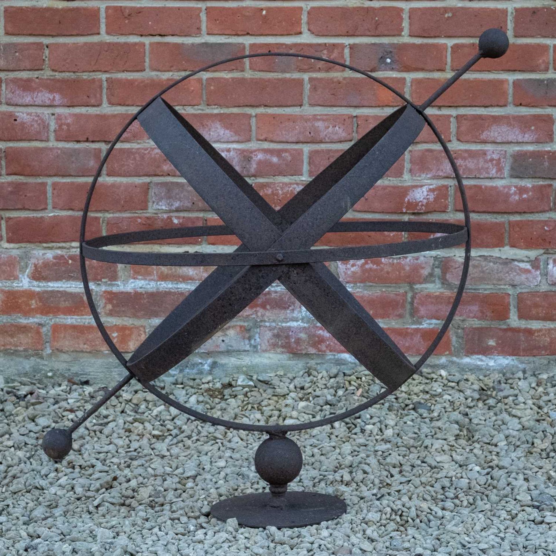 A large wrought iron armillary sphere sundial