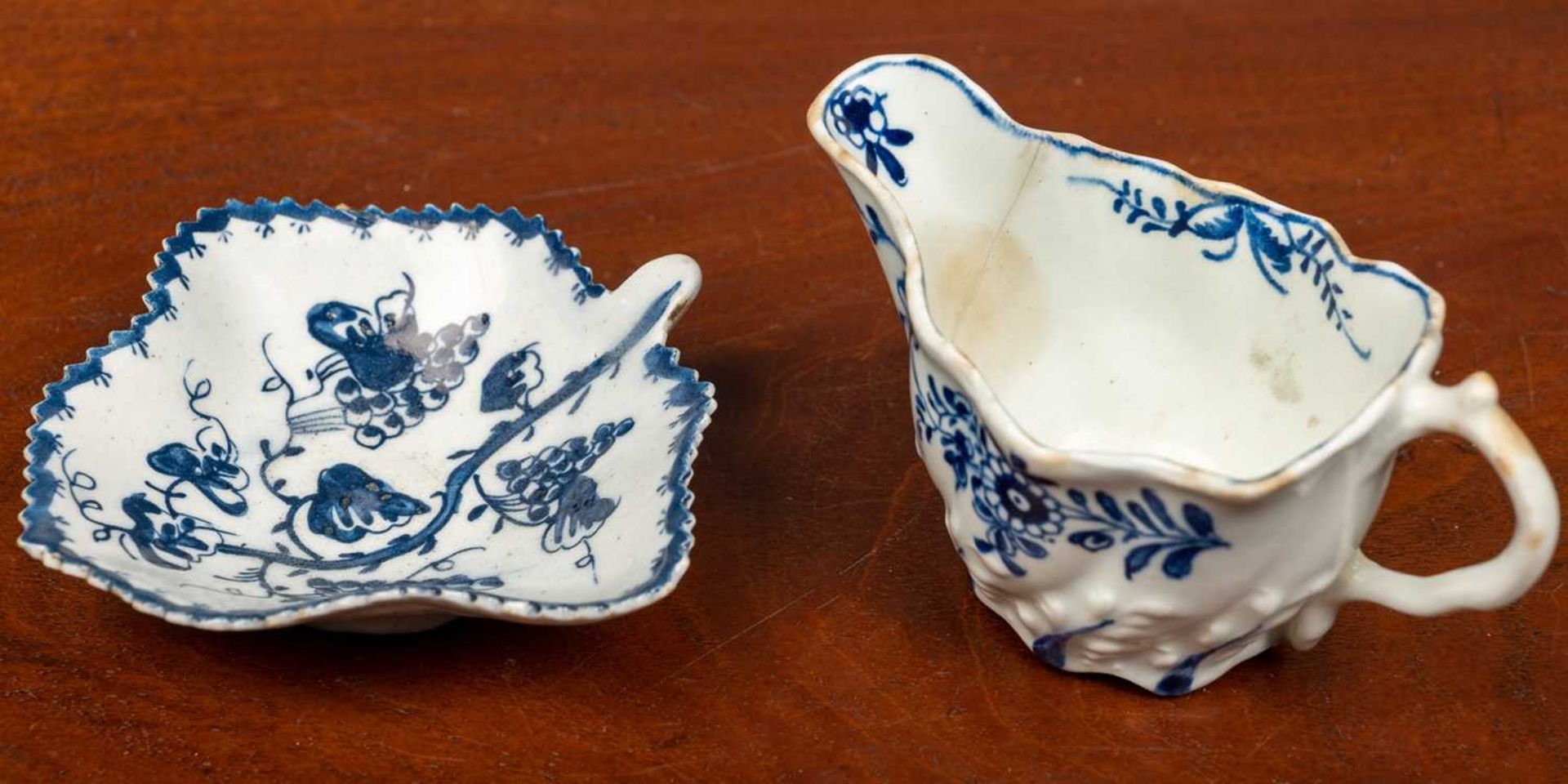 A small 18th century possibly Liverpool pickle dish and a possibly Worcester cream jug