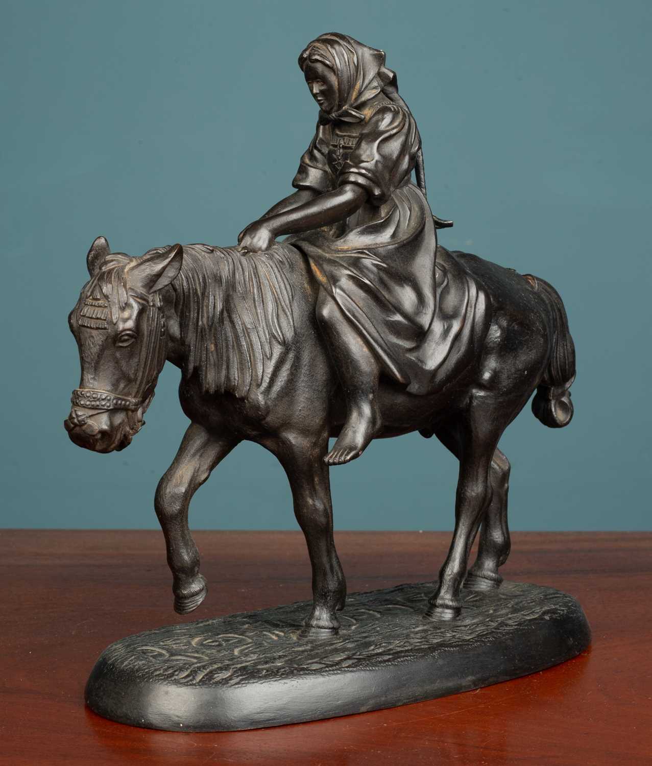 A Russian cast iron sculpture of a figure on the back of a mule - Image 2 of 4