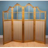 An early to mid 20th century giltwood four-fold screen