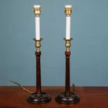A pair of Georgian style wooden fluted 'candlestick' lampstands