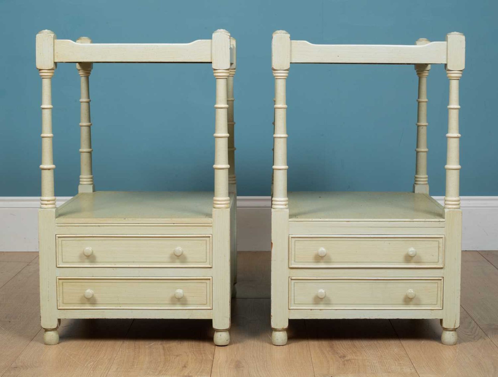 A pair of modern painted two-tier bedside tables