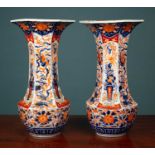 A pair of large Imari style vases