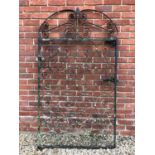 A black painted wrought iron single gate