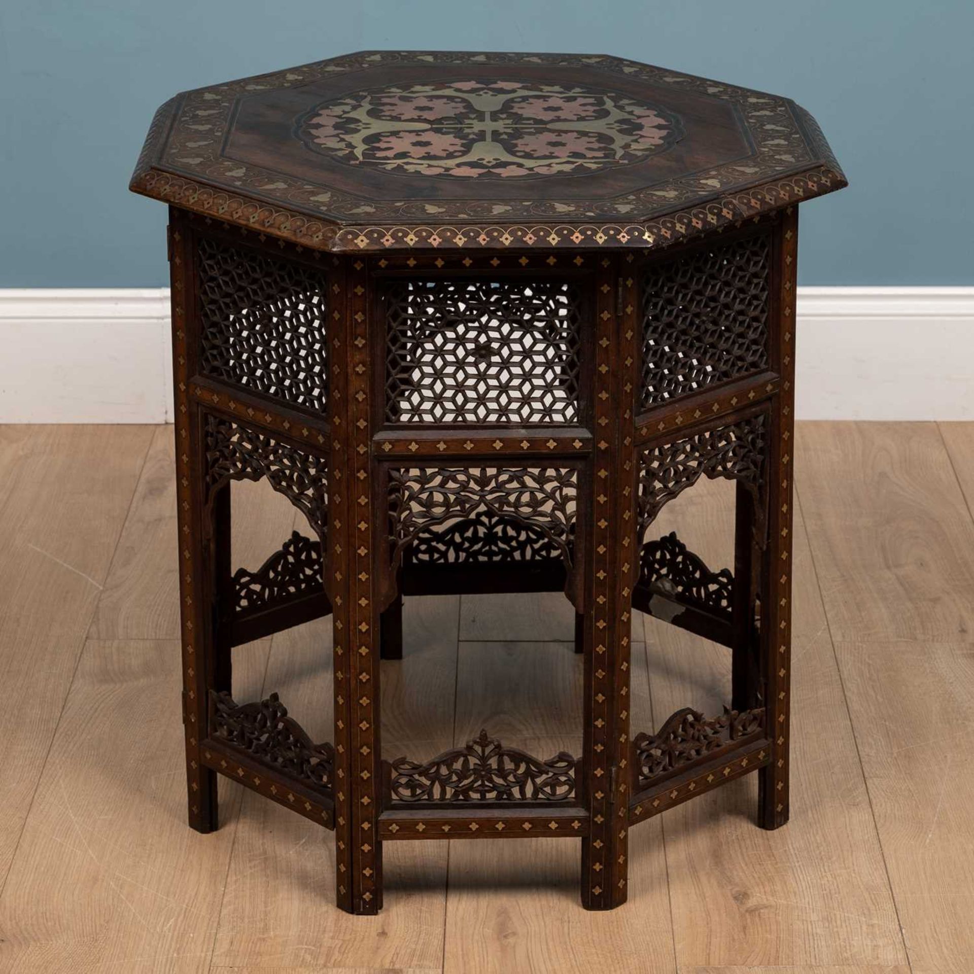 A late 19th century style Anglo-Indian octagonal folding coffee table