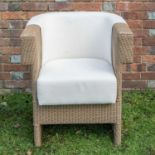 A Lloyd Loom conservatory chair