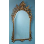 An 18th century Baroque style giltwood mirror