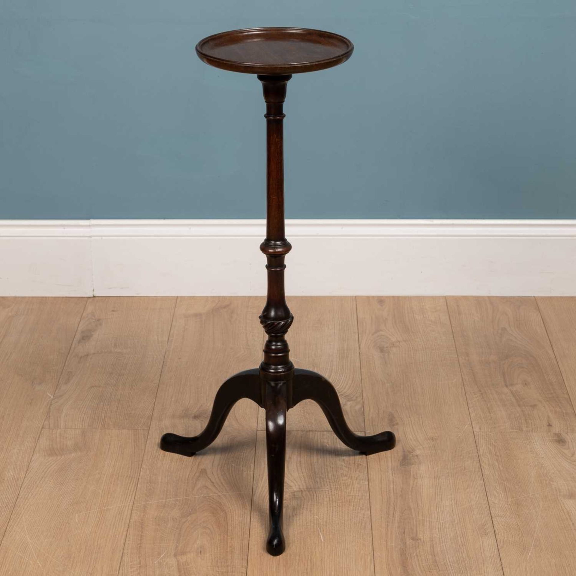 A 19th century mahogany lamp table