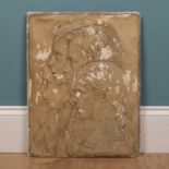 A 19th Century plaster plaque with profile portraits in relief of four children
