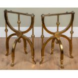 A pair of antique lacquered brass coffin stands
