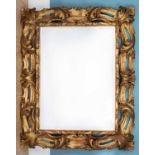 An 18th century Florentine style giltwood wall mirror