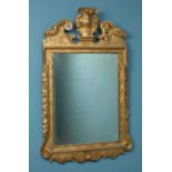 A George II style carved gilt wall mirror