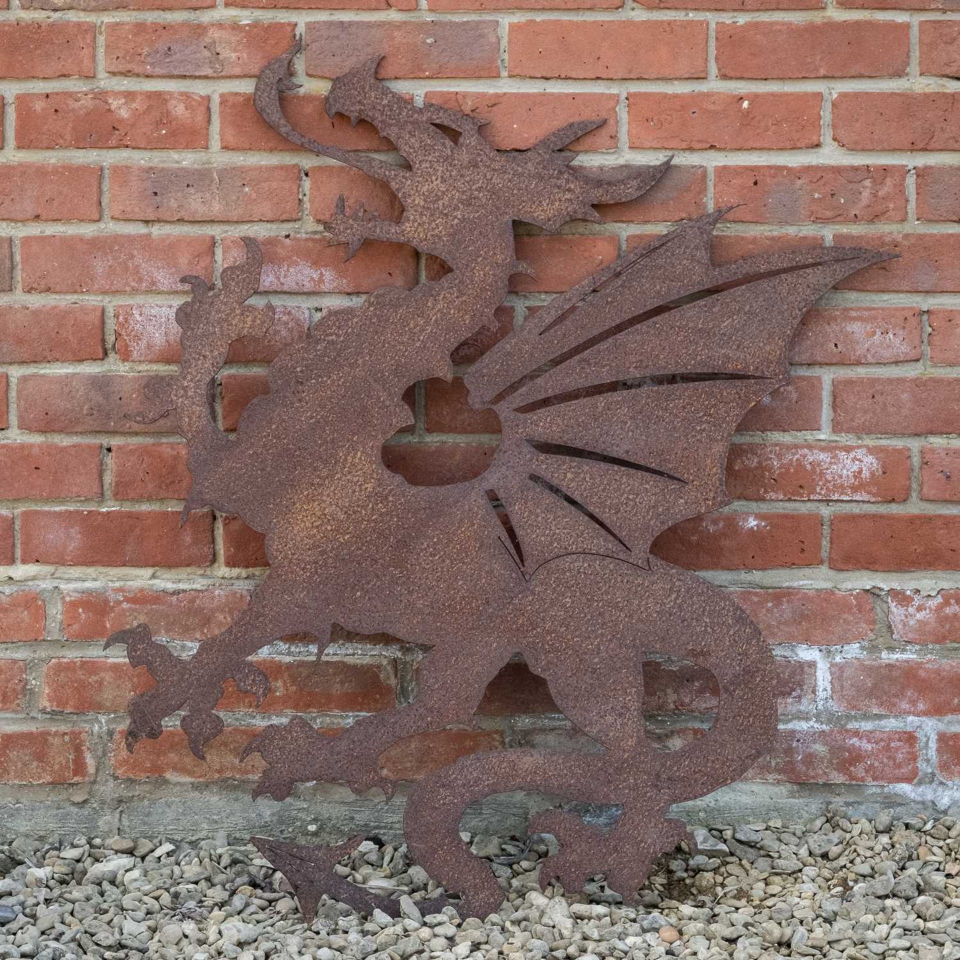 A pierced steel silhouette of the Welsh dragon