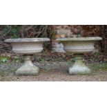 A pair of Haddonstone garden urns
