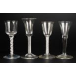 A group of four antique wine glasses