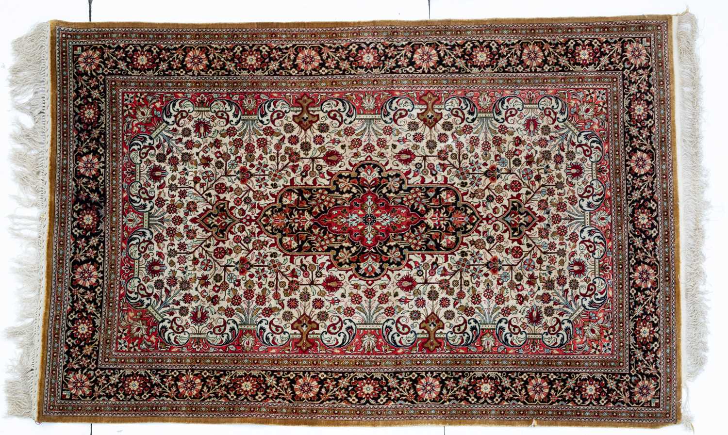 An Indian silk rug