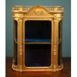 A small 19th century gilt wall cabinet
