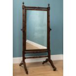 A 19th century mahogany cheval mirror