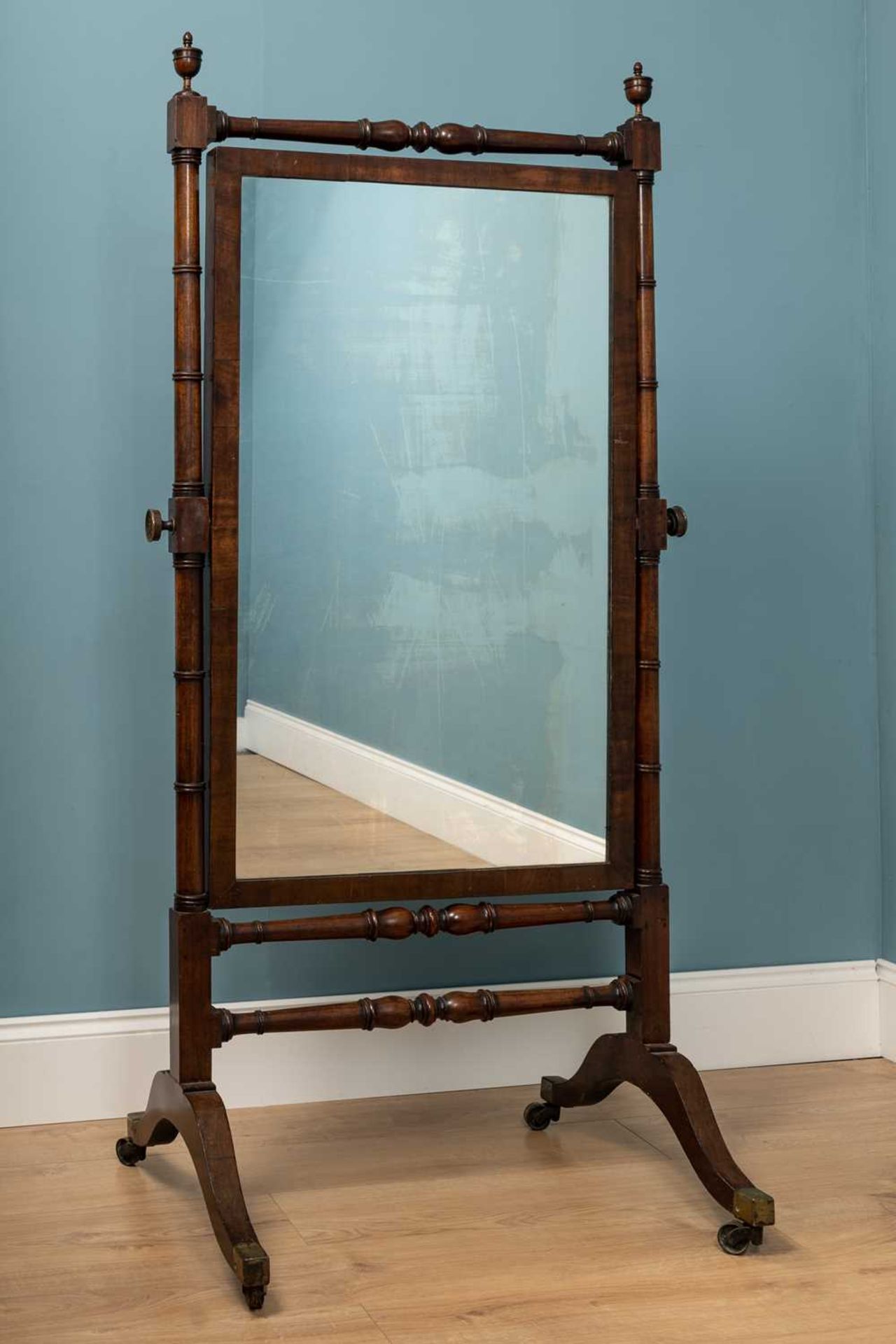 A 19th century mahogany cheval mirror