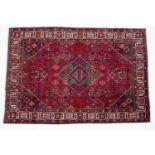 A Middle Eastern Meimeh red ground rug
