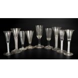 A collection of nine various antique wine glasses