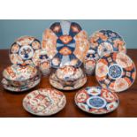 A collection of late 19th century and later Japanese Imari porcelain, comprising of a pair of vases,