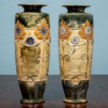 A pair of Royal Doulton Secessionist vases, with sunflower decorations, monogrammed to base 'MB',