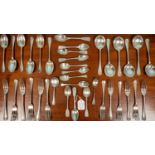 A collection of silver and silver plated cutlery, comprising of six spoons, six soup spoons,