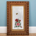 A gypsy mirror, decorated with flowers, oak framed, 82cm high x 52cm wide (altogether) and 57cm high