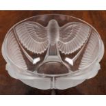 A Lalique style glass bowl with moulded decoration of doves, 26cm diameterIn good condition