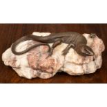 A bronze salamander sculpture on a solid agate stone base, 17cm lengthGood condition.